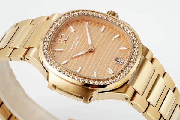 096C2710-9DBF-38B1-7D10-990BC93EDA39.webp Patek Philippe Rose Gold Nautilus Watch
