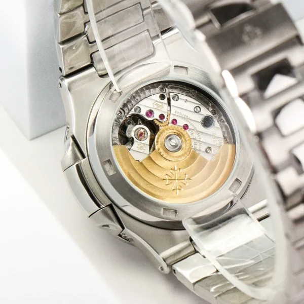 215B9D25-D44B-E622-9B28-7BCBD6C49488.webp Patek Philippe Nautilus Black Perpetual Calendar