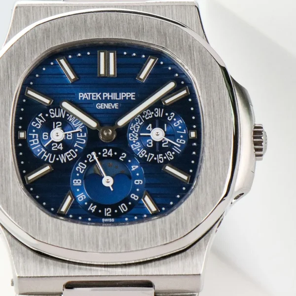23782C0A-BA07-EF6D-6D57-0EF2AEAD602B.webp Patek Philippe Blue Nautilus Perpetual Watch