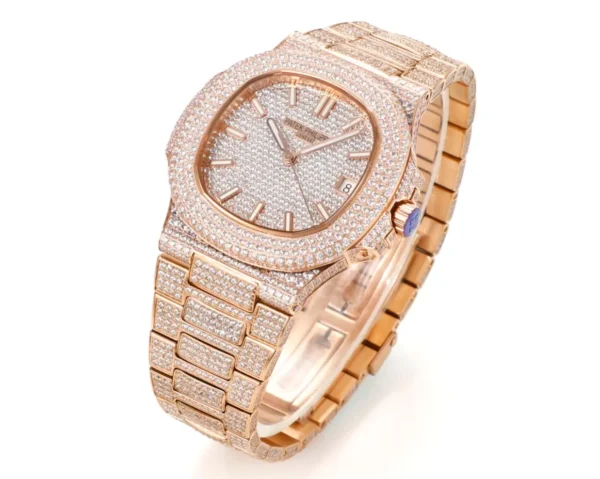 3084CF1C-1E0C-B808-DD08-B34EFA520142.webp Patek Philippe Nautilus Rose Gold Watch