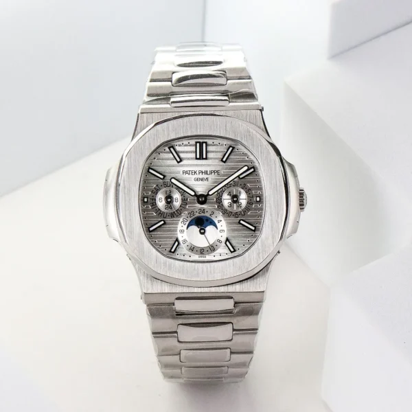 3D93978D-98A6-17AC-04DE-6008A59C33CE.webp Patek Philippe Silver Nautilus Watch