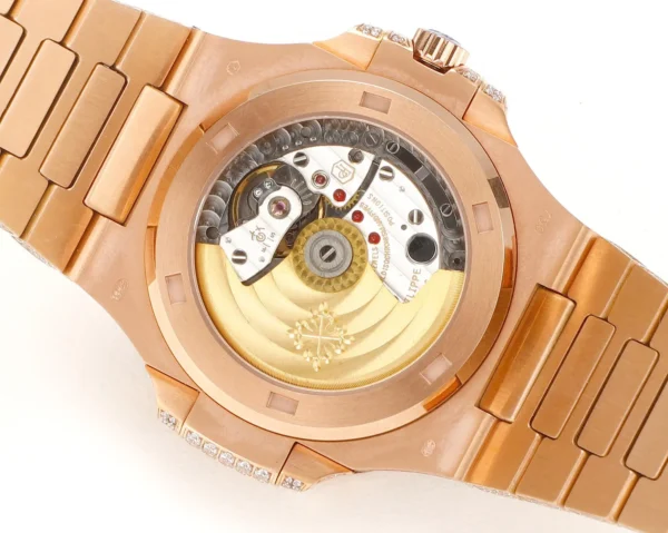 44BFBDDF-2D9A-F7FC-A3D5-4ACD578F7D4D.webp Patek Philippe Nautilus Rose Gold Watch