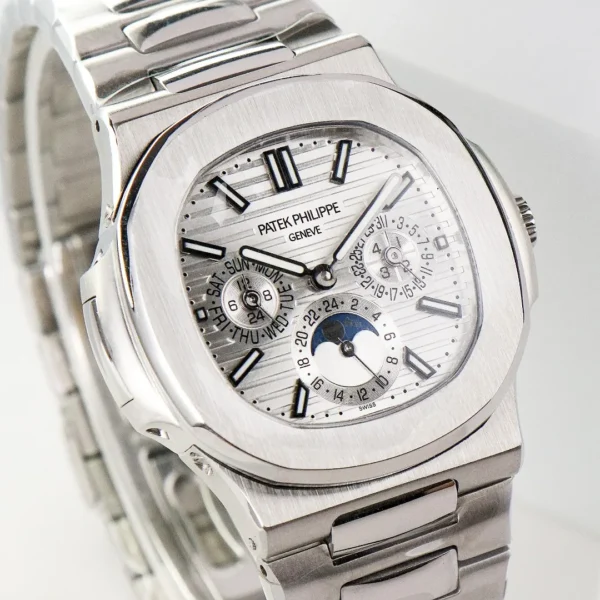 6BDCD6B1-F9BD-4D51-F1F4-5B877BB2E8F9.webp Patek Philippe Silver Nautilus Watch