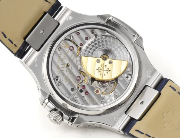 790DA9FC-4BE5-0CD3-5E88-F9D9A0DC74C3.webp Patek Philippe Blue Nautilus Perpetual Watch