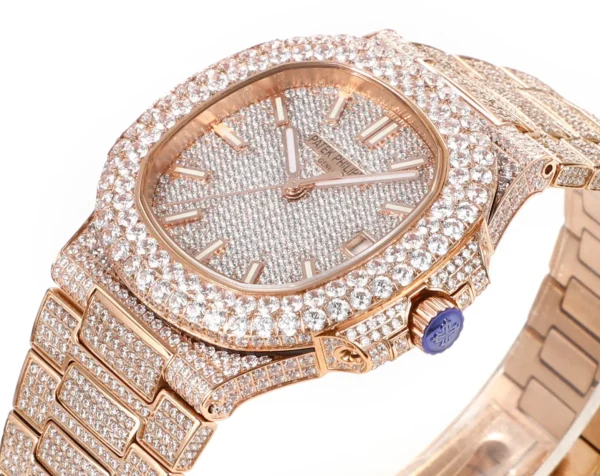 8942EB63-9437-959E-4A94-0188ABA82A19.webp Patek Philippe Nautilus Rose Gold Watch