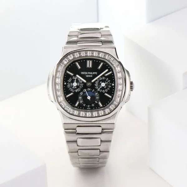 99FC4C2A-20CE-D03F-923D-1C595C81838A.webp Patek Philippe Nautilus Black Perpetual Calendar