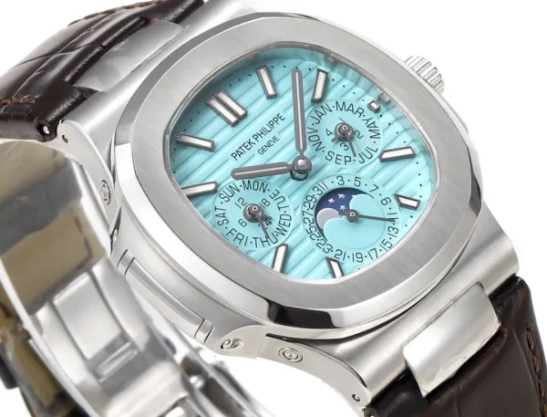 BE1360D7-3640-497F-E773-10BB59C2CB43.webp Patek Philippe Nautilus Blue Perpetual Calendar
