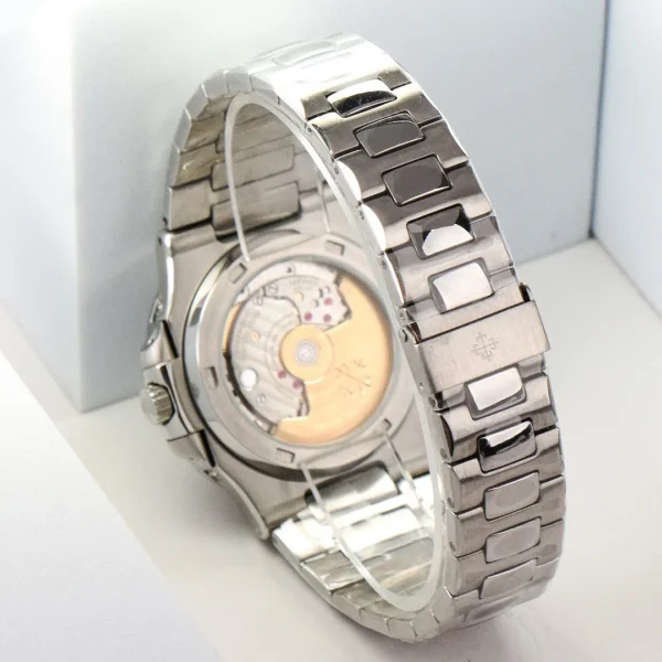 C07786FC-C736-8687-7156-79D3E79A8D28.webp Patek Philippe Nautilus Black Perpetual Calendar