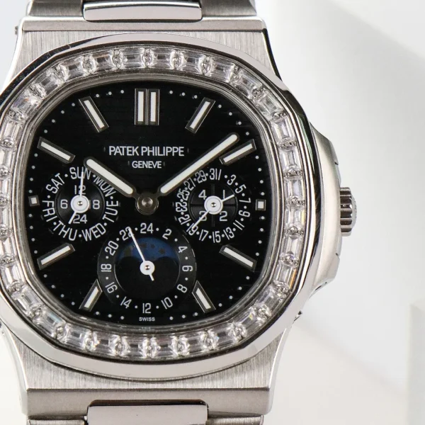 E7706B46-0E19-5A53-9FFC-3C7ED16B56A5.webp Patek Philippe Nautilus Black Perpetual Calendar