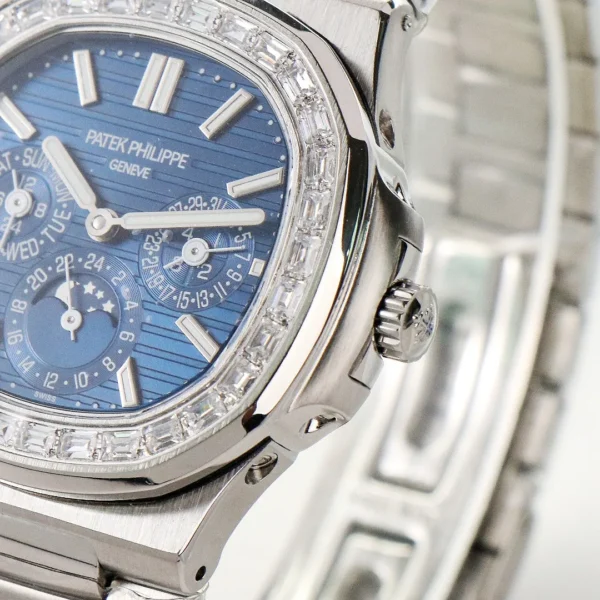 EB2A2D7C-2DA5-8A9E-DA2C-4A59C1F19546.webp Patek Philippe Blue Nautilus Perpetual Watch