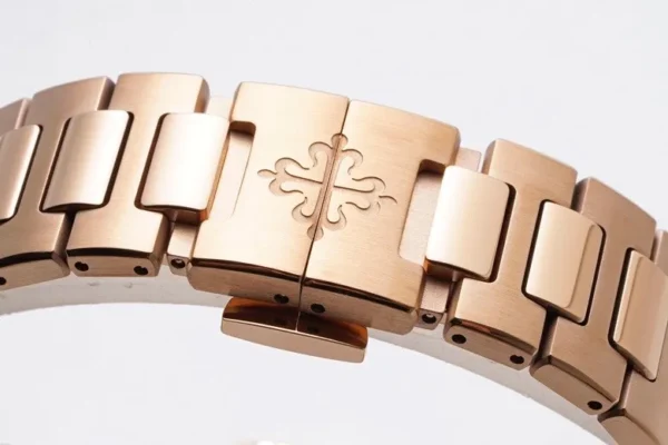 EE7A4743-EFE5-75FB-4771-B883B54DB8D3.webp Patek Philippe Rose Gold Nautilus Watch